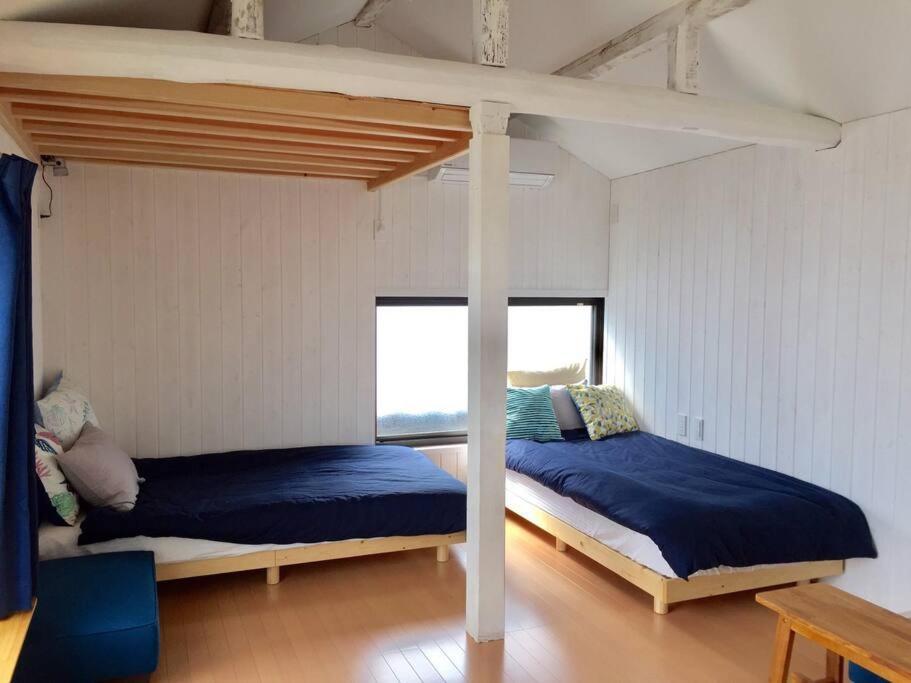 佐渡 ビーチまで0分 1客のみ オーシャンビュー Beach Side House ウッドデッキ Sado Bagian luar foto