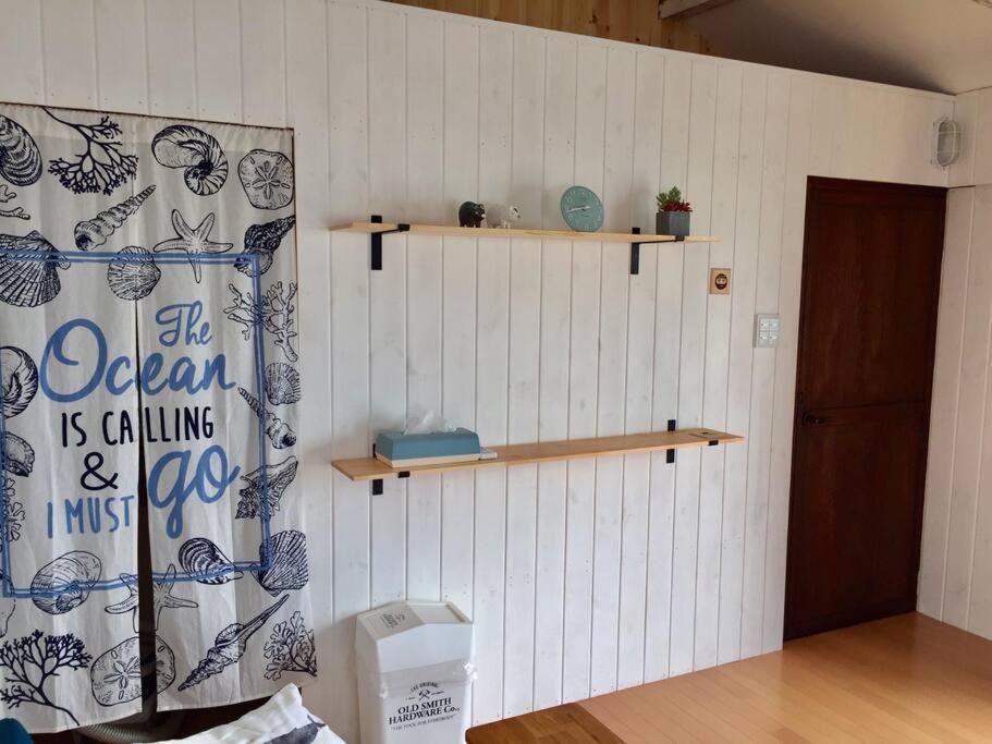 佐渡 ビーチまで0分 1客のみ オーシャンビュー Beach Side House ウッドデッキ Sado Bagian luar foto